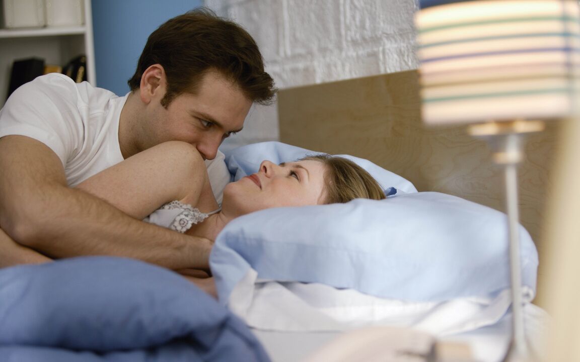 woman in bed with a male penis enlargement